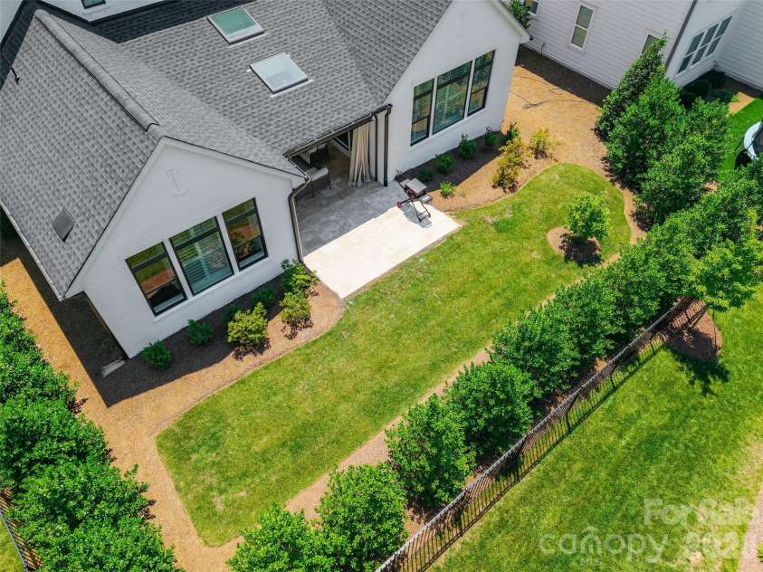 4031 Pritchard Place, Fort Mill, SC 29715.  MLS# CAR4391499, YatesRealty ID 5821. Aerial Backyard Left