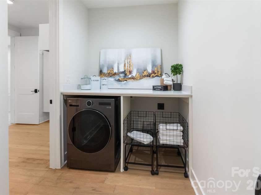 4031 Pritchard Place, Fort Mill, SC 29715.  MLS# CAR4391499, YatesRealty ID 5821. Laundry on Main between garage and primary closet (2 in 1 machine)