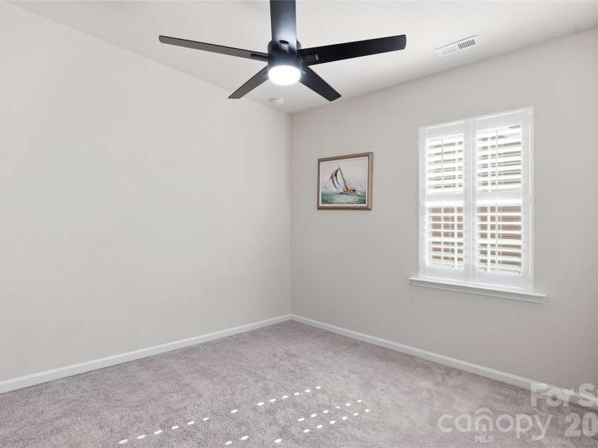 3162 Windhaven Lane, Tega Cay, SC 29708.  MLS# CAR4434420, YatesRealty ID 58210. Bedroom #3 with upgraded ceiling fan