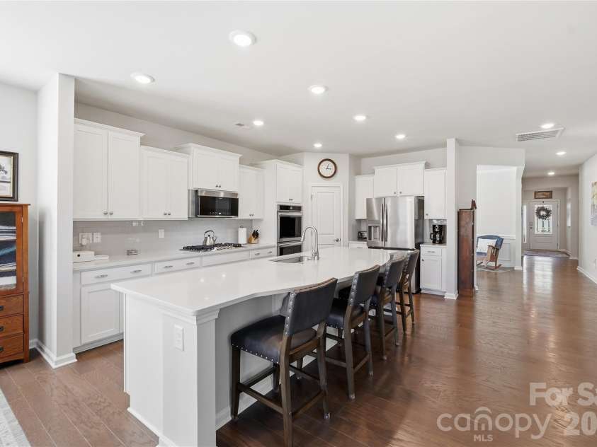 3162 Windhaven Lane, Tega Cay, SC 29708.  MLS# CAR4434420, YatesRealty ID 58210. Large kitchen island with additional seating