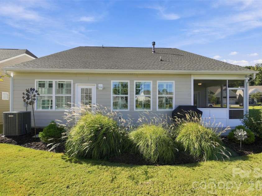 3162 Windhaven Lane, Tega Cay, SC 29708.  MLS# CAR4434420, YatesRealty ID 58210. Ornamental grasses providing privacy
