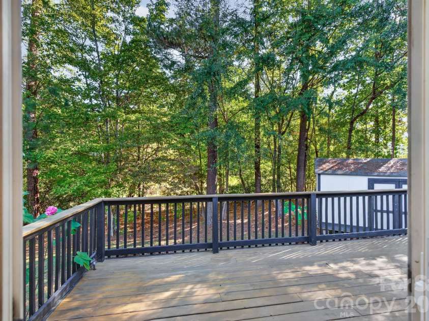 702 Painted Lady Court, Rock Hill, SC 29732.  MLS# CAR4433746, YatesRealty ID 58212. Huge elevated rear deck overlooking a private, tree-lined sanctuary—ideal for summer barbecues.