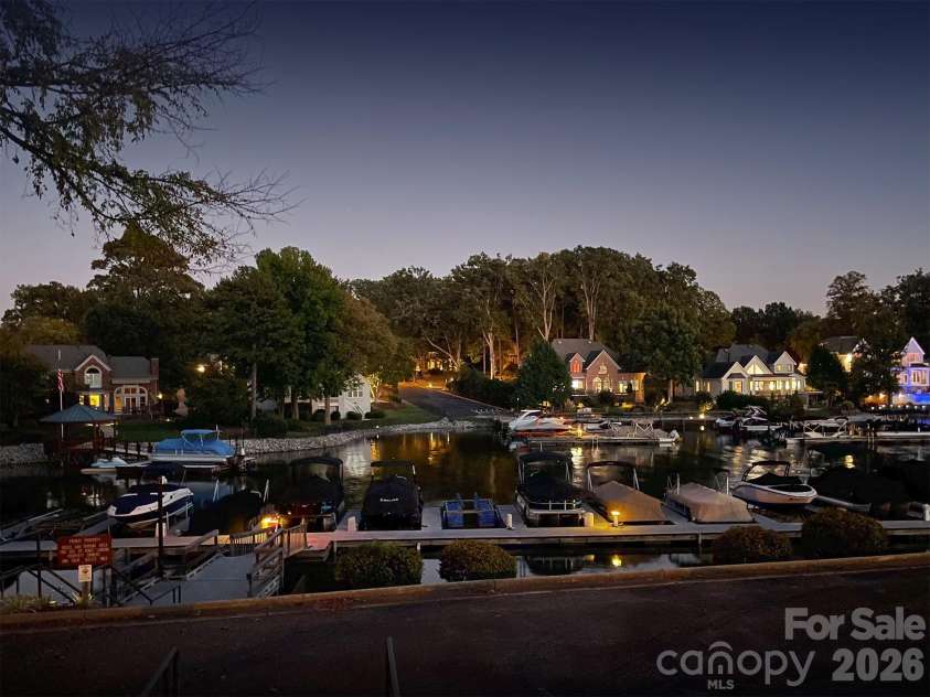 105 Kings Crest Drive, Mooresville, NC 28117.  MLS# CAR4434427, YatesRealty ID 58217. Boat Slips at Night