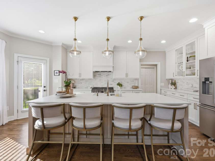105 Kings Crest Drive, Mooresville, NC 28117.  MLS# CAR4434427, YatesRealty ID 58217. Breakfast Bar in Kitchen with Hidden Storage Underneath