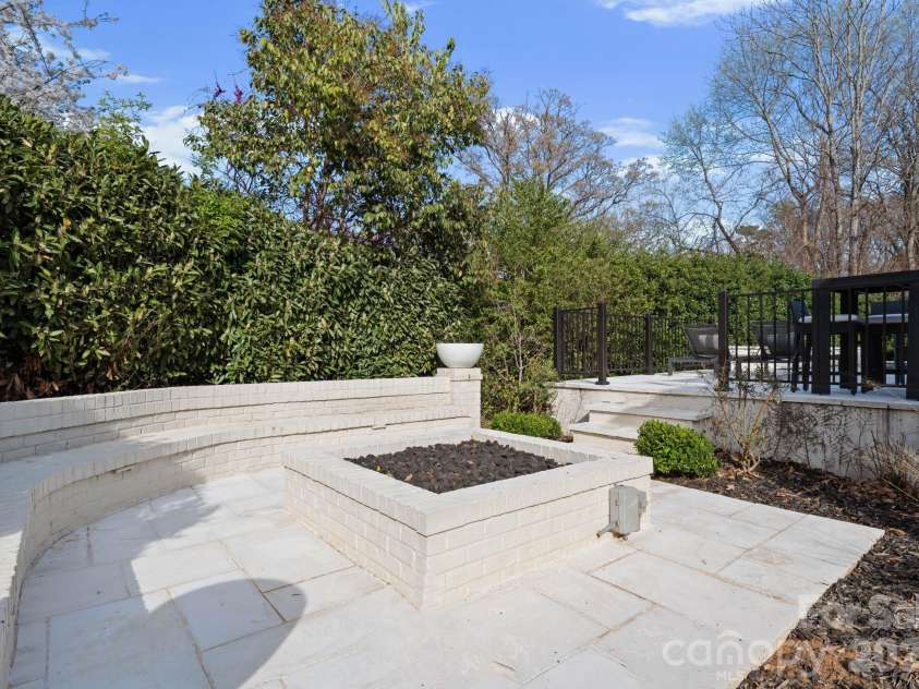 2043 Sharon Lane, Charlotte, NC 28211.  MLS# CAR4357556, YatesRealty ID 5822. Firepit 