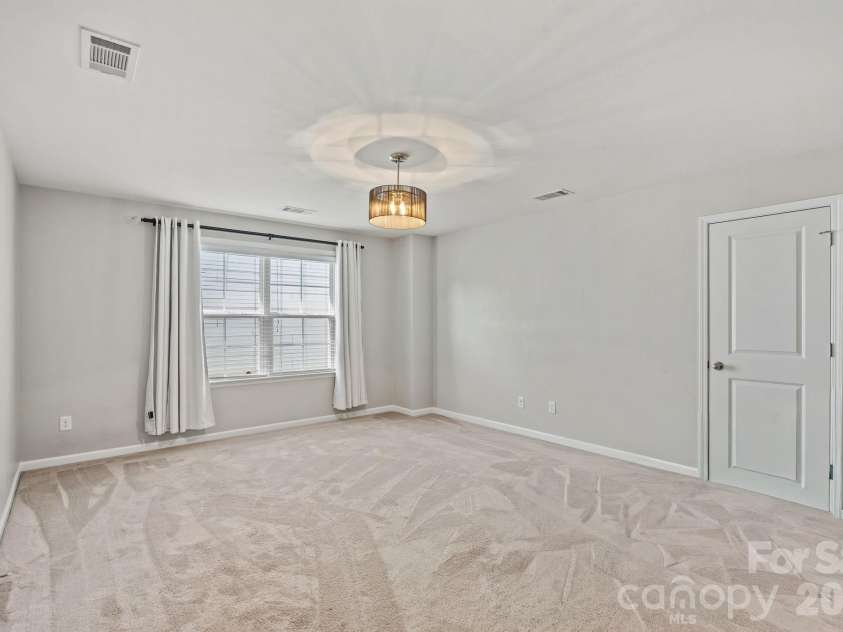 11237 Black Brant Lane, Charlotte, NC 28278.  MLS# CAR4435300, YatesRealty ID 58223. Upper level loft with walk-in attic access