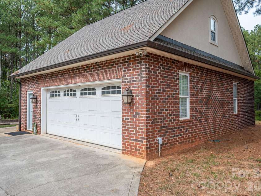 2750 Arbor Hills Drive, Lincolnton, NC 28092.  MLS# CAR4426870, YatesRealty ID 58224. Detached Garage with storage above
