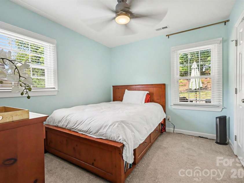 5621 Alanhurst Place, Charlotte, NC 28217.  MLS# CAR4424544, YatesRealty ID 58226. Lower Guest Bedroom