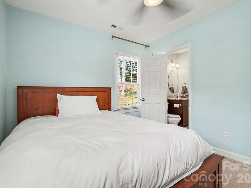 5621 Alanhurst Place, Charlotte, NC 28217.  MLS# CAR4424544, YatesRealty ID 58226. Lower Guest Bedroom