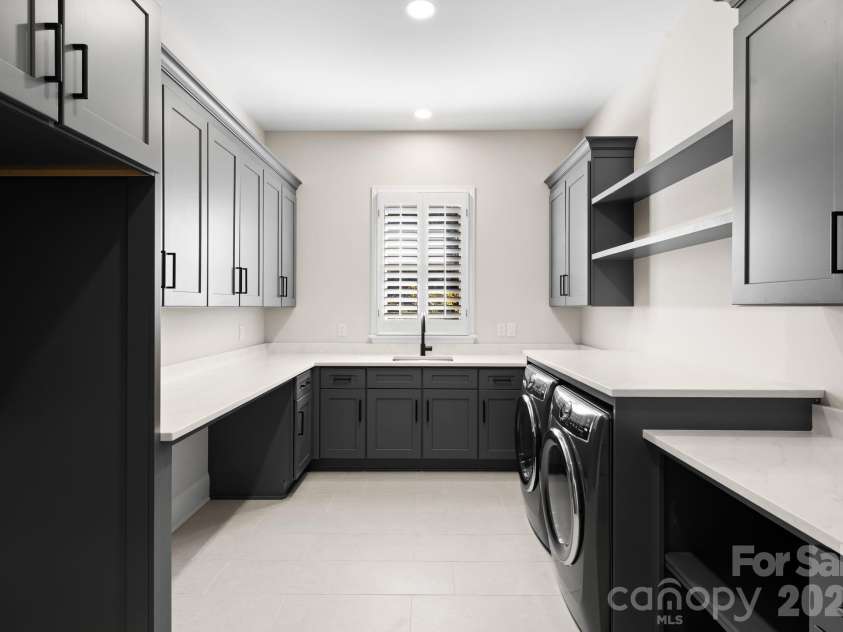 8721 Lake Challis Lane, Charlotte, NC 28226.  MLS# CAR4339803, YatesRealty ID 5823. Laundry Room 