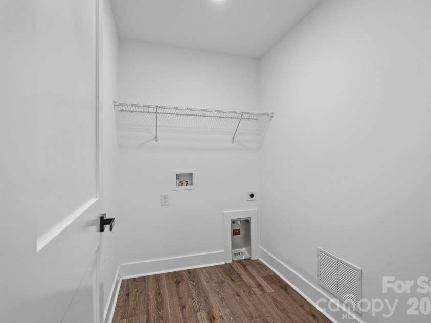 1949 Garibaldi Avenue, Charlotte, NC 28208.  MLS# CAR4412297, YatesRealty ID 58233. Laundry Room