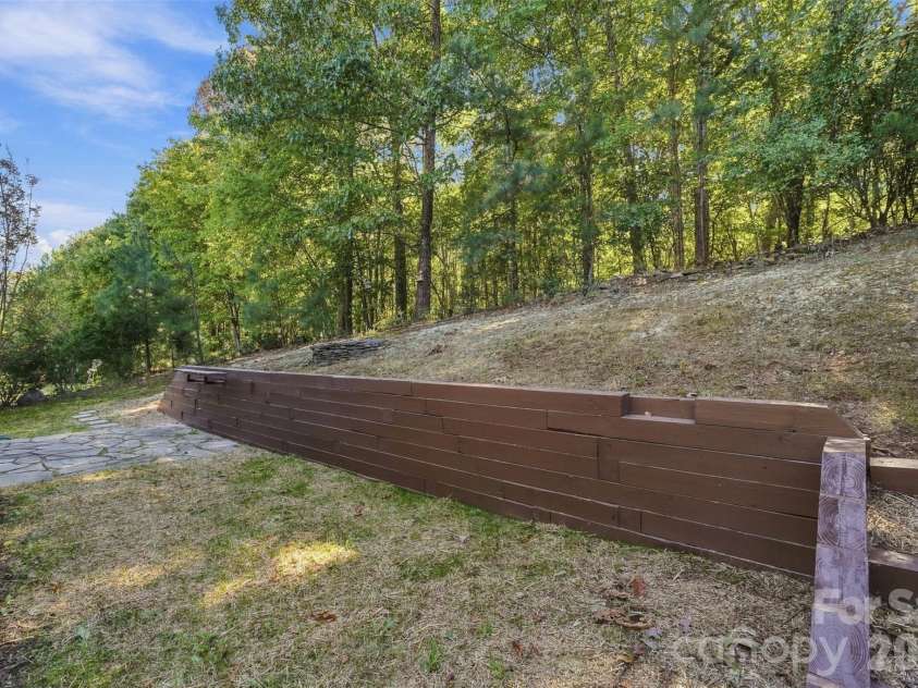 1901 Beckwith Lane, Waxhaw, NC 28173.  MLS# CAR4436790, YatesRealty ID 58239. Retaining wall with grilling ledge.