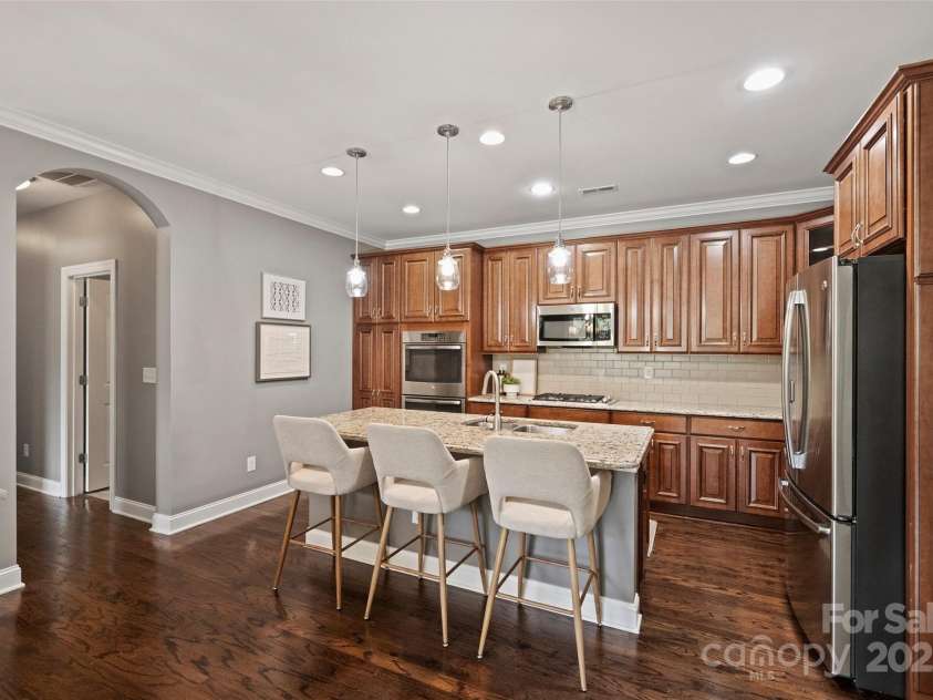 1281 Restoration Drive, Waxhaw, NC 28173.  MLS# CAR4274527, YatesRealty ID 5825. Kitchen with Island seating