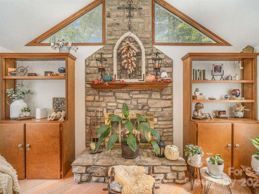 15450 Millview Trace Lane, Mint Hill, NC 28227.  MLS# CAR4195517, YatesRealty ID 5826. Formal Living Room Featuring Fireplace & Storage Shelves