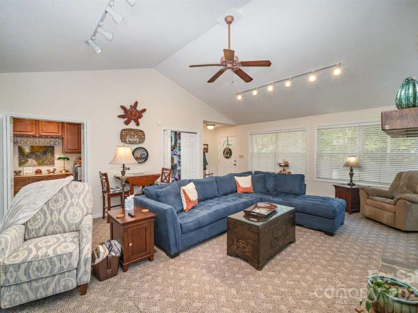 15450 Millview Trace Lane, Mint Hill, NC 28227.  MLS# CAR4195517, YatesRealty ID 5826. Informal Living Room Featuring Dry Bar Area & Storage