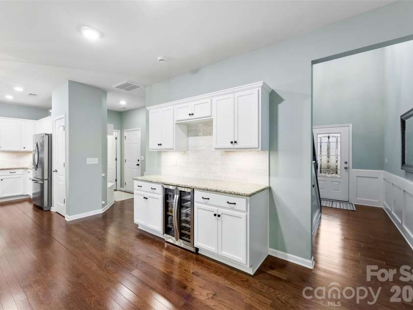 1230 Hideaway Gulch Drive, Fort Mill, SC 29715.  MLS# CAR4349933, YatesRealty ID 5827. Drybar w/beverage fridge