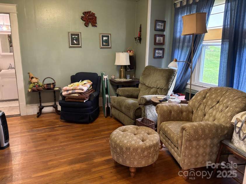 212 Mitchell Avenue, Bakersville, NC 28705.  MLS# CAR4238398, YatesRealty ID 5827. Den or third bedroom