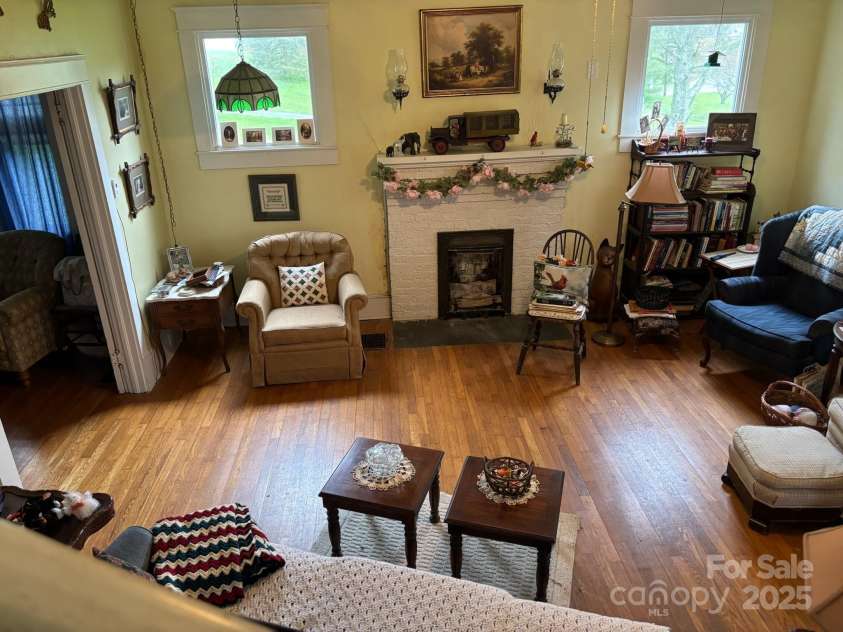 212 Mitchell Avenue, Bakersville, NC 28705.  MLS# CAR4238398, YatesRealty ID 5827. Living room