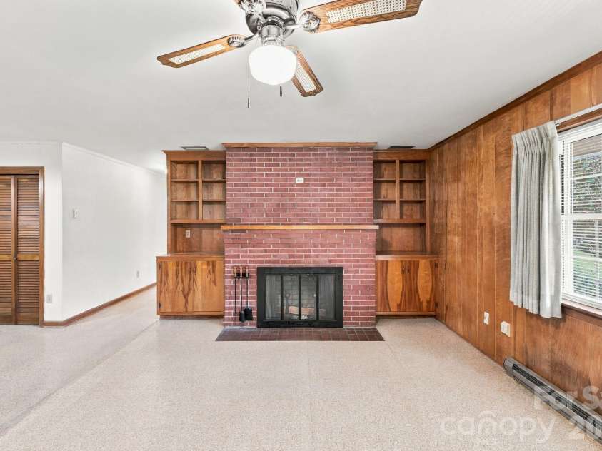 140 Winterlocken Road, Salisbury, NC 28144.  MLS# CAR4436715, YatesRealty ID 58309. Den with built-ins