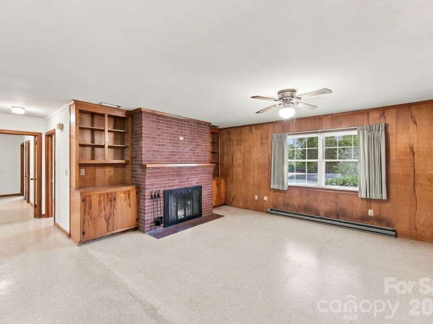 140 Winterlocken Road, Salisbury, NC 28144.  MLS# CAR4436715, YatesRealty ID 58309. Den with Fireplace