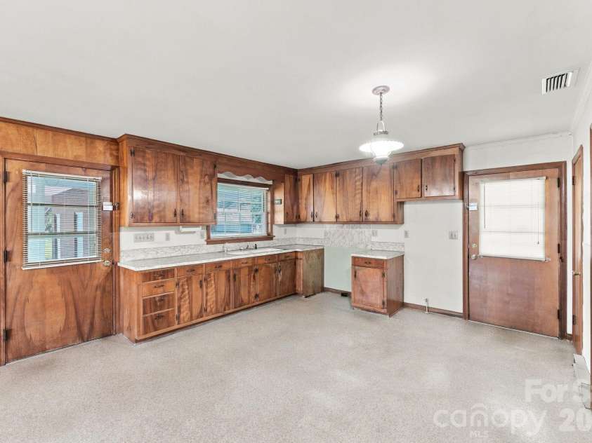 140 Winterlocken Road, Salisbury, NC 28144.  MLS# CAR4436715, YatesRealty ID 58309. Kitchen and Backdoor