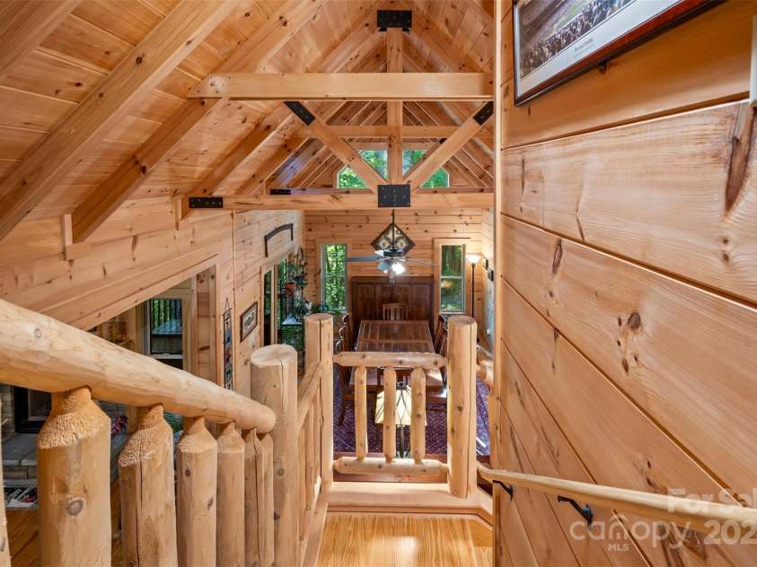 136 Knob Lane, Lake Lure, NC 28746.  MLS# CAR4177604, YatesRealty ID 5831. Stairs to left bedroom and bathroom