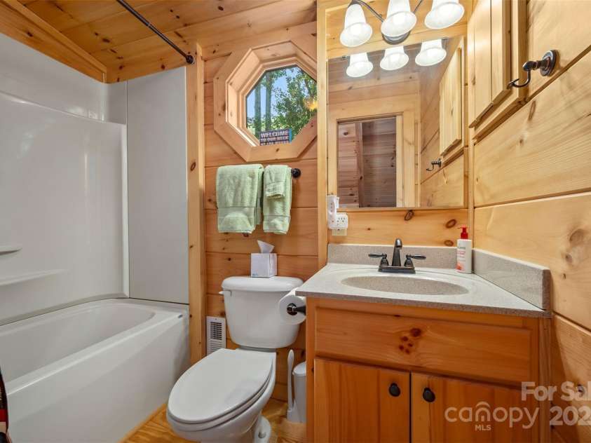 136 Knob Lane, Lake Lure, NC 28746.  MLS# CAR4177604, YatesRealty ID 5831. Upper Level Bathroom
