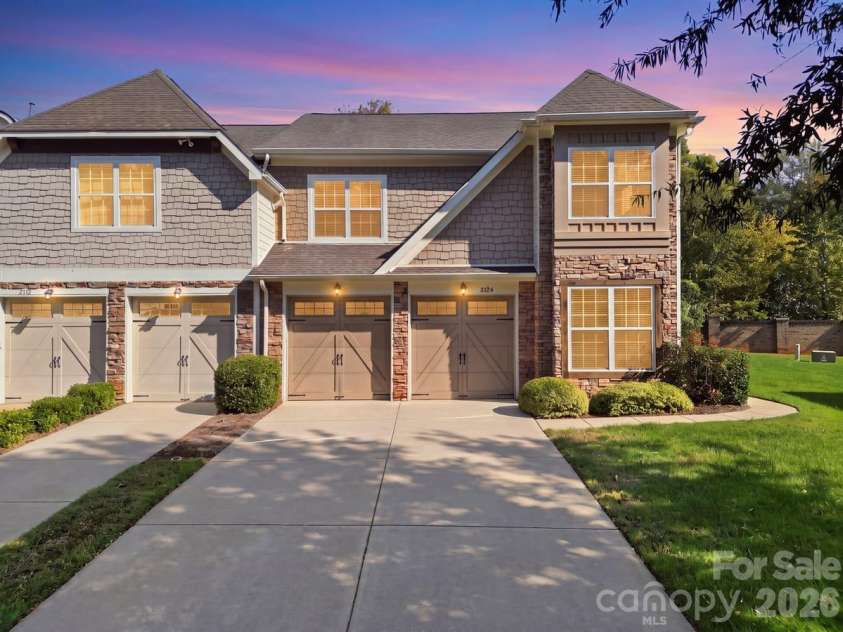 8424 Loxton Circle, Charlotte, NC 28214.  MLS# CAR4435879, YatesRealty ID 58311. Virtually enhanced twilight photo