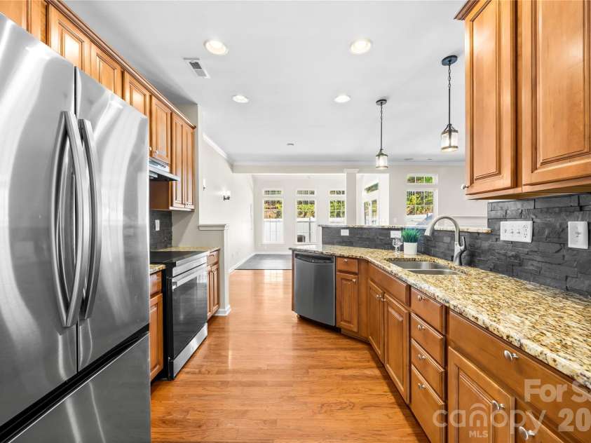 156 Arcadian Way, Mooresville, NC 28117.  MLS# CAR4434144, YatesRealty ID 58331. Beautiful kitchen! Nearly new refrigerator conveys!