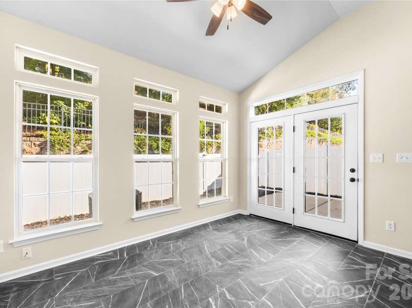 156 Arcadian Way, Mooresville, NC 28117.  MLS# CAR4434144, YatesRealty ID 58331. Sunroom opens to patio
