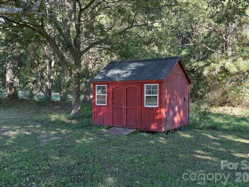 1140 Upper Palmer Road, Salisbury, NC 28146.  MLS# CAR4426041, YatesRealty ID 58332. Back yard shed