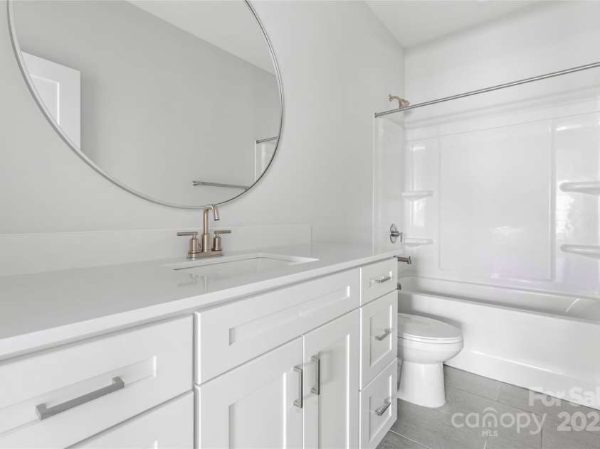 710 Falling Oak Alley, Huntersville, NC 28078.  MLS# CAR4243015, YatesRealty ID 5836. Downstairs Bathroom