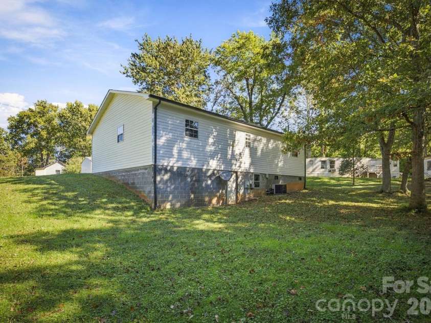 2476 Watts Street, Morganton, NC 28655.  MLS# CAR4437342, YatesRealty ID 58369. Back Yard