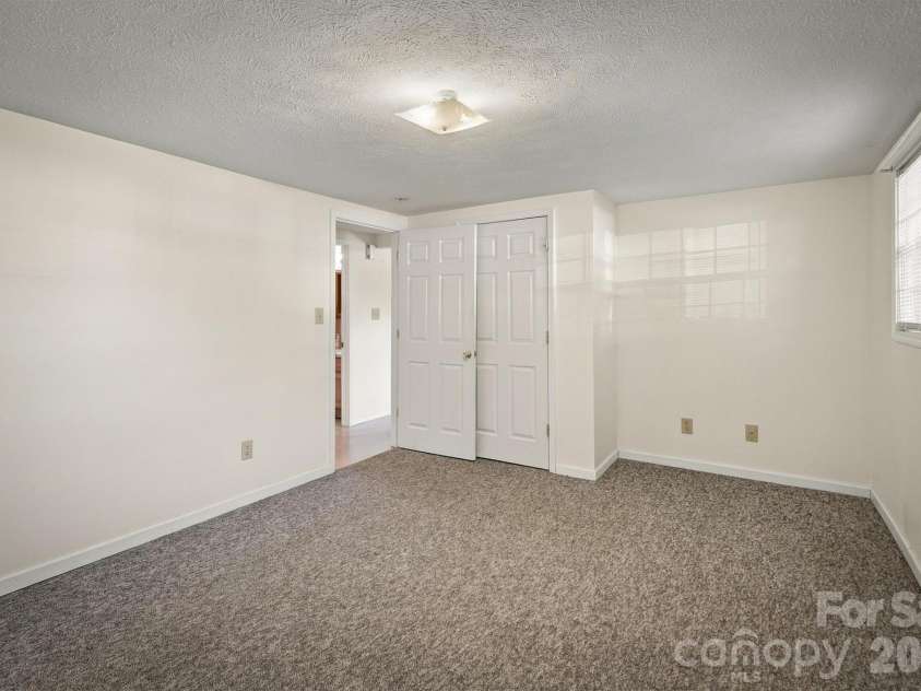 2476 Watts Street, Morganton, NC 28655.  MLS# CAR4437342, YatesRealty ID 58369. Primary Bedroom