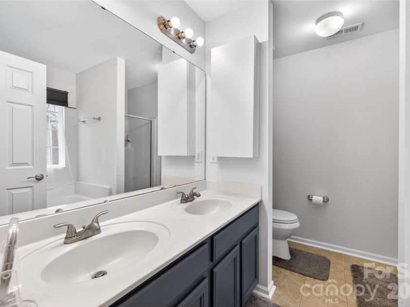 1007 Wind Carved Lane, Monroe, NC 28110.  MLS# CAR4349726, YatesRealty ID 5837. Master Bathroom
