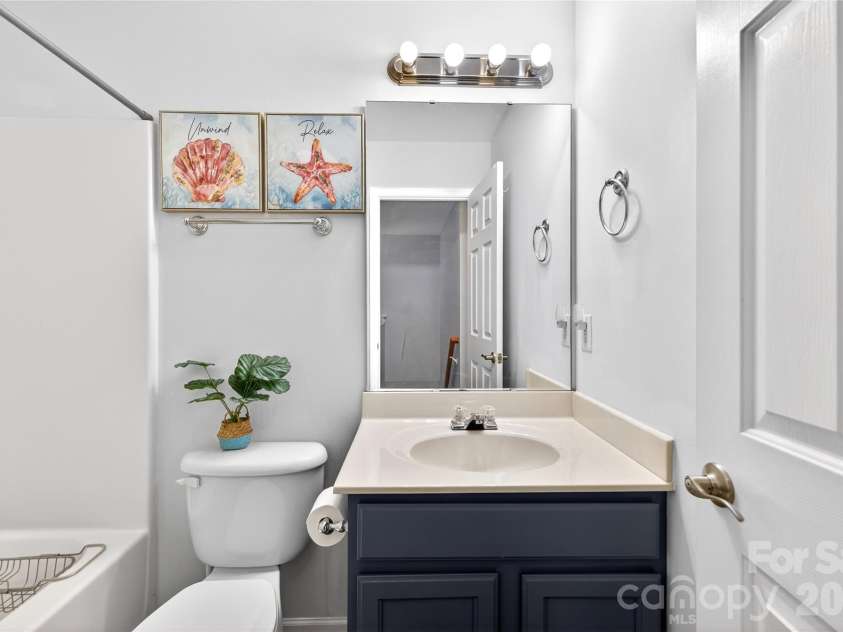 1007 Wind Carved Lane, Monroe, NC 28110.  MLS# CAR4349726, YatesRealty ID 5837. Upstairs Bathroom