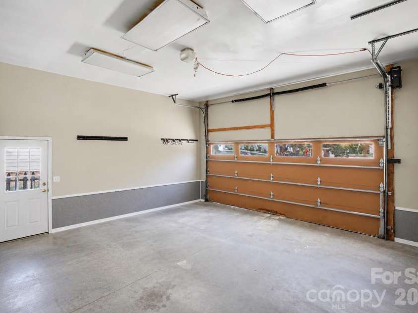 9732 Whitewood Trail, Charlotte, NC 28269.  MLS# CAR4432809, YatesRealty ID 58381. Virtually staged garage