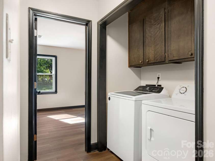 1100 Dark Wood Court, Matthews, NC 28105.  MLS# CAR4436676, YatesRealty ID 58403. Laundry