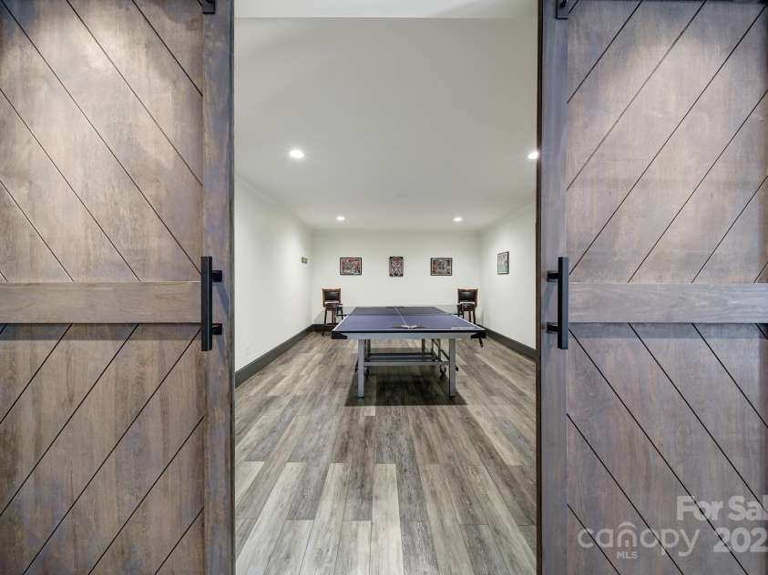 141 Forsythia Lane, Tega Cay, SC 29708.  MLS# CAR4243630, YatesRealty ID 5841. Lower Level Game Room