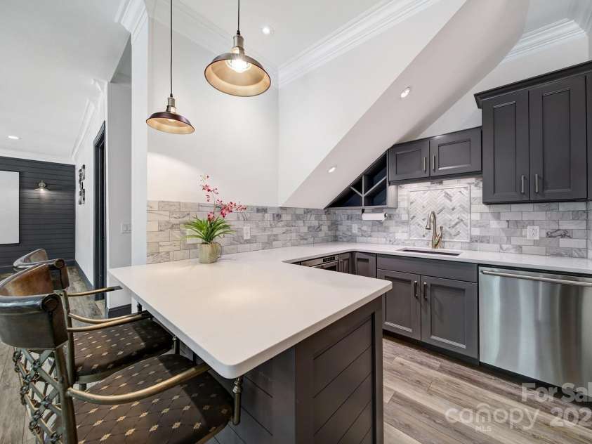 141 Forsythia Lane, Tega Cay, SC 29708.  MLS# CAR4243630, YatesRealty ID 5841. Lower Level Kitchen