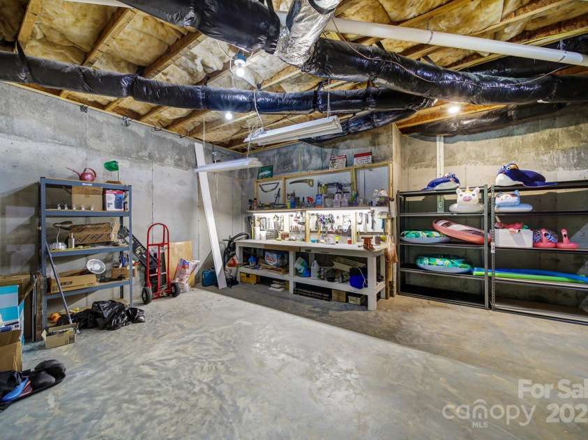 141 Forsythia Lane, Tega Cay, SC 29708.  MLS# CAR4243630, YatesRealty ID 5841. Lower Level Storage Room