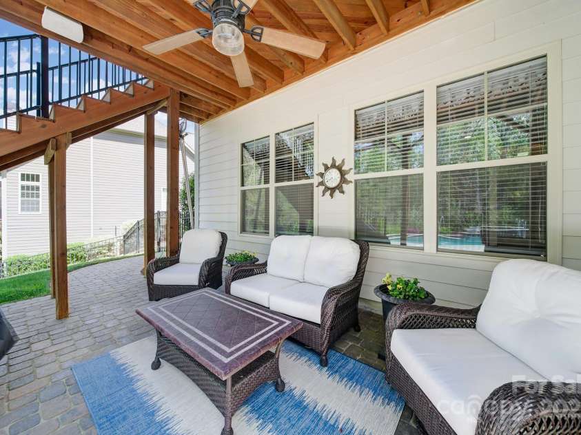 141 Forsythia Lane, Tega Cay, SC 29708.  MLS# CAR4243630, YatesRealty ID 5841. Pool Side Patio