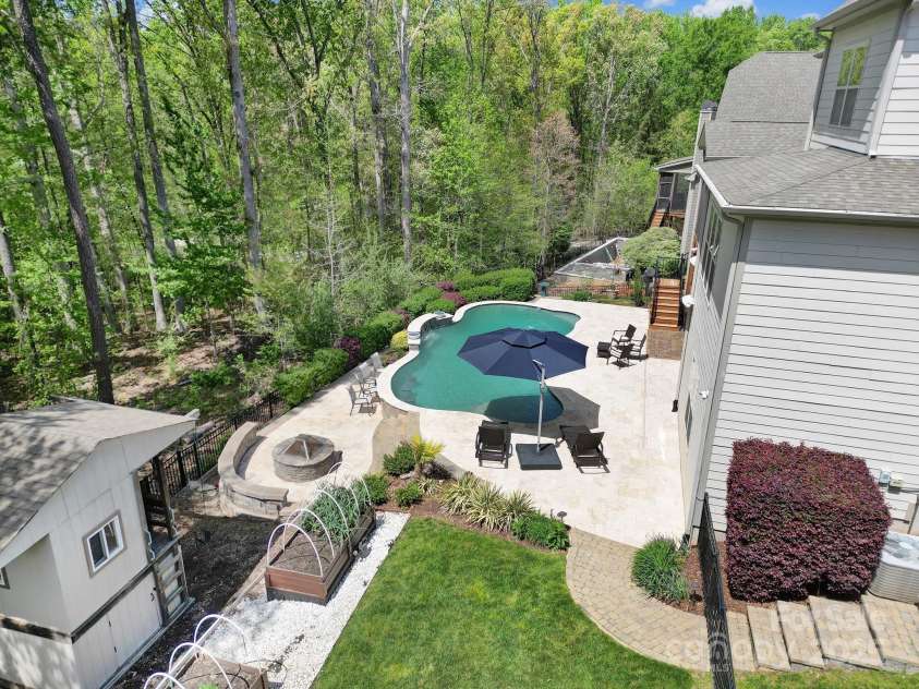 141 Forsythia Lane, Tega Cay, SC 29708.  MLS# CAR4243630, YatesRealty ID 5841. Pool View from the Garage