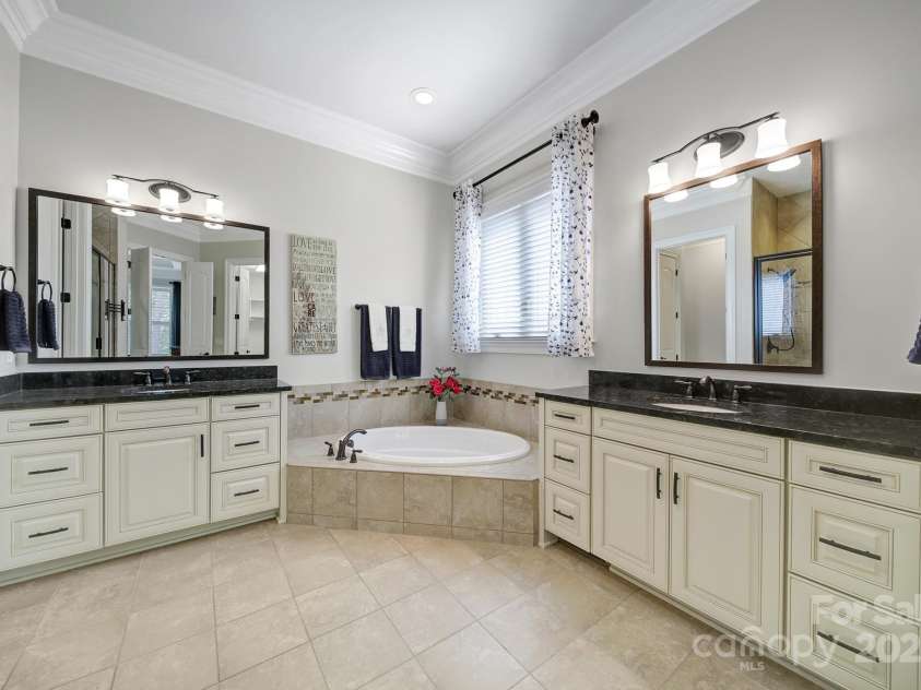 141 Forsythia Lane, Tega Cay, SC 29708.  MLS# CAR4243630, YatesRealty ID 5841. Primary Bathroom On Main