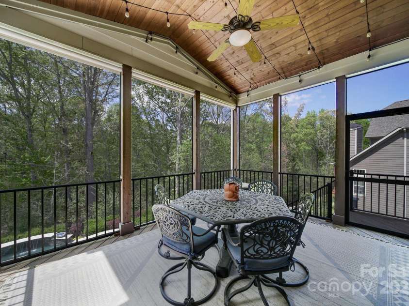 141 Forsythia Lane, Tega Cay, SC 29708.  MLS# CAR4243630, YatesRealty ID 5841. Screen Porch Over Pool