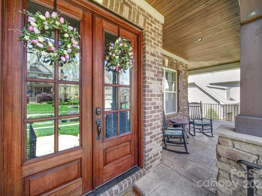 141 Forsythia Lane, Tega Cay, SC 29708.  MLS# CAR4243630, YatesRealty ID 5841. Wrap Around Porch