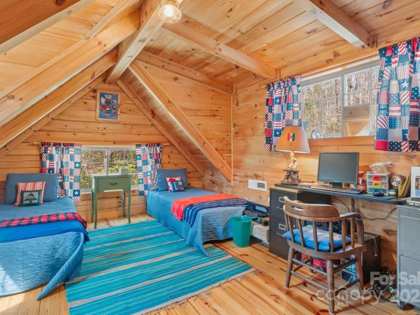 787 Shumont Road, Black Mountain, NC 28711.  MLS# CAR4239152, YatesRealty ID 5845. Loft space used as a bedroom