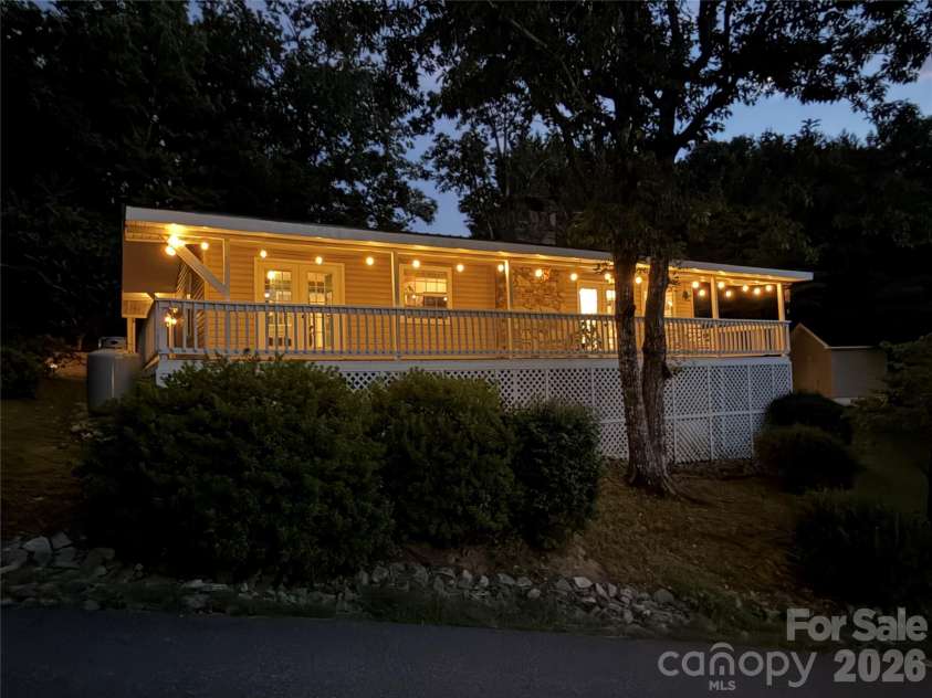 130 Sherwood Drive, Lake Lure, NC 28746.  MLS# CAR4437633, YatesRealty ID 58459. Magical setting!