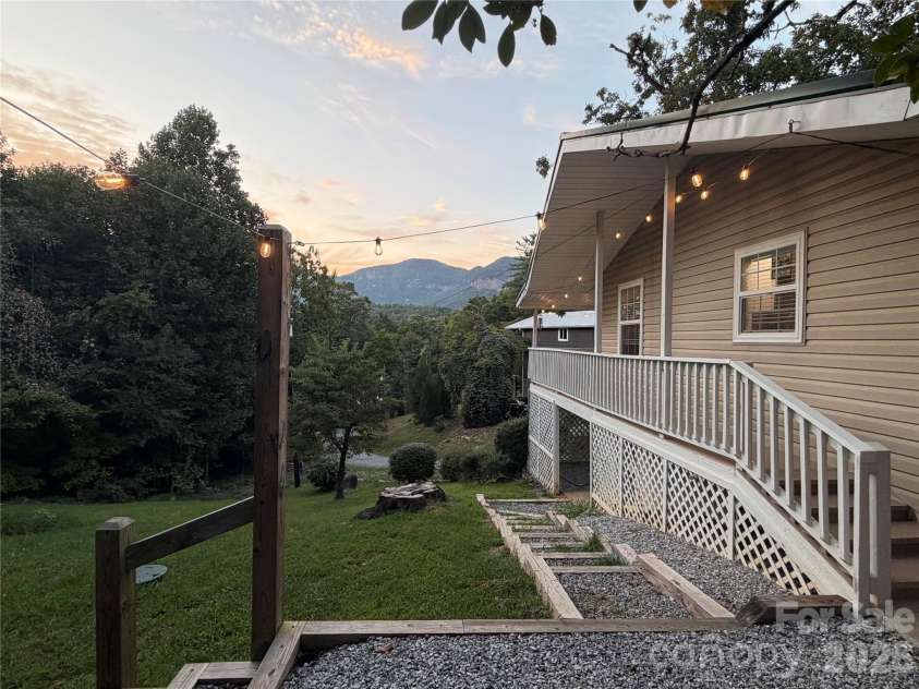130 Sherwood Drive, Lake Lure, NC 28746.  MLS# CAR4437633, YatesRealty ID 58459. Nice yard