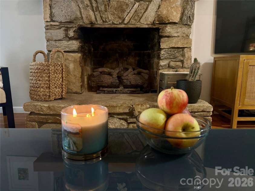 130 Sherwood Drive, Lake Lure, NC 28746.  MLS# CAR4437633, YatesRealty ID 58459. Stone fireplace